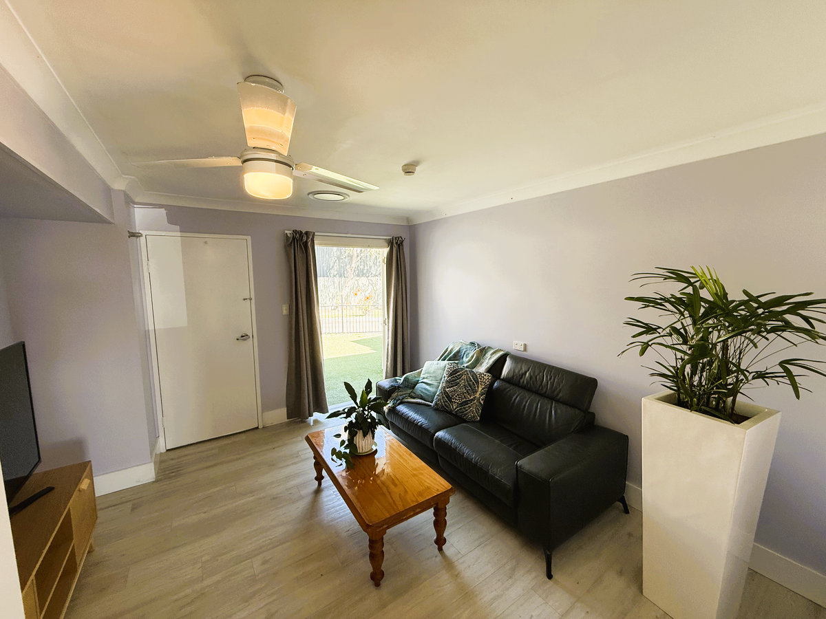 Carlton House lounge room with courtyard access