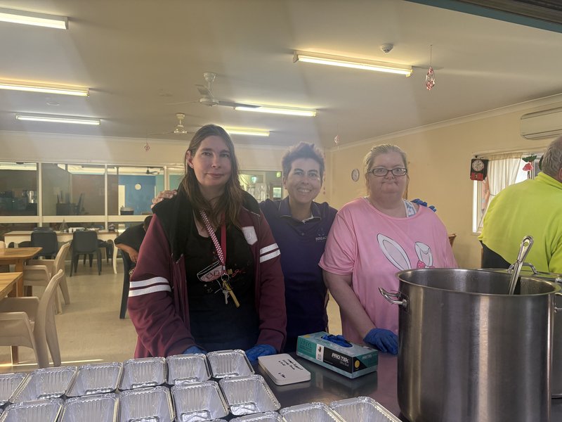 Team members preparing meals
