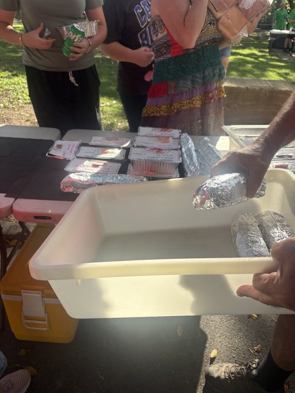 Distributing meals at Queens Park