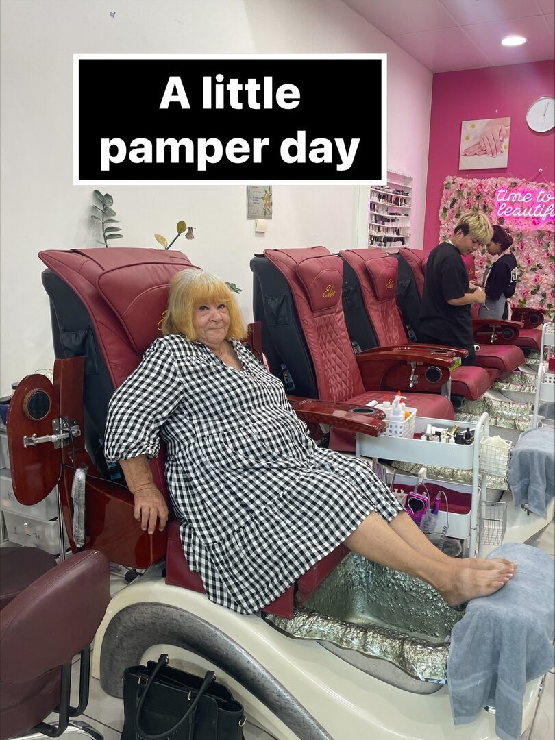 Thelma enjoying a pamper day pedicure during community participation